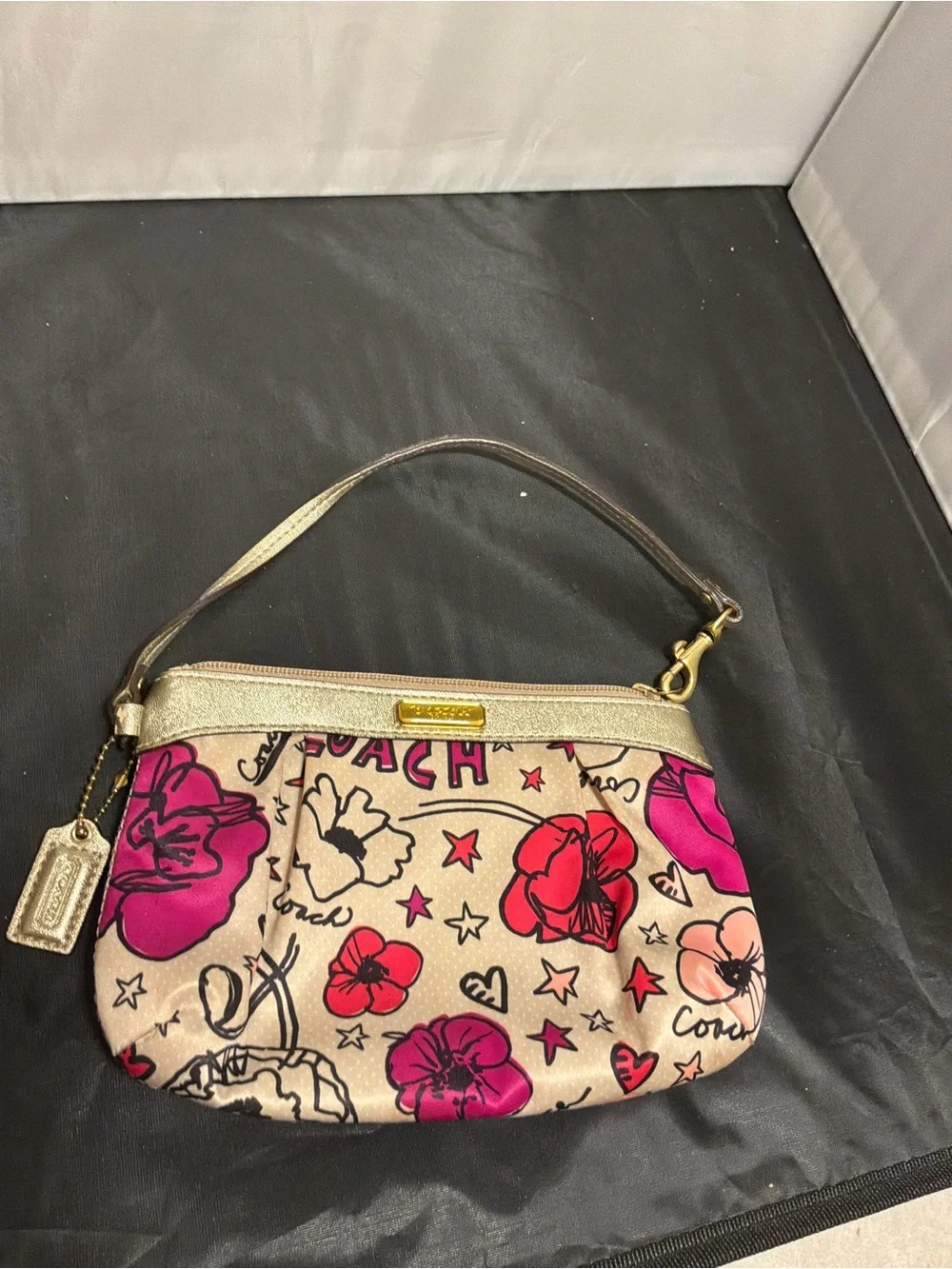 Coach graffiti wristlet